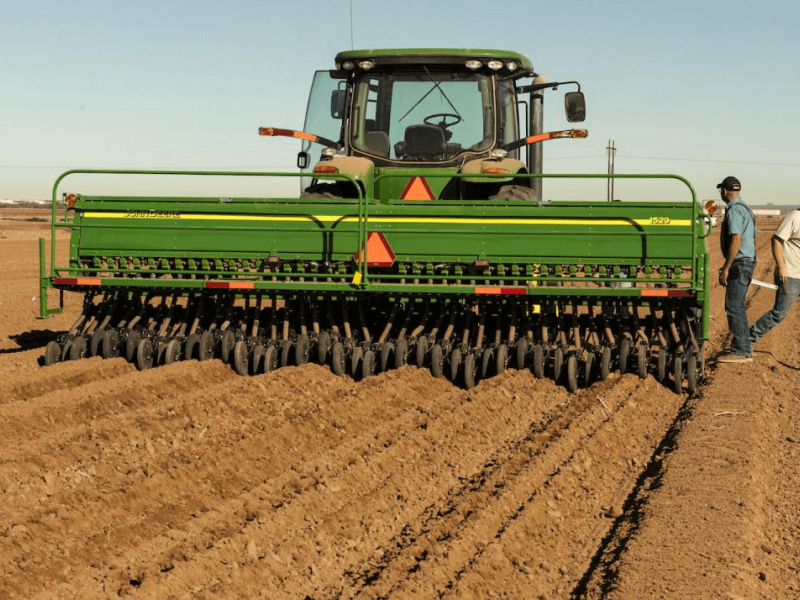 The seed drill is programmed to plant seed at a depth of 2-3 inches.